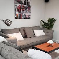 Modern 2 bedroom 1 bath home with barbeque grill and sauna pool.