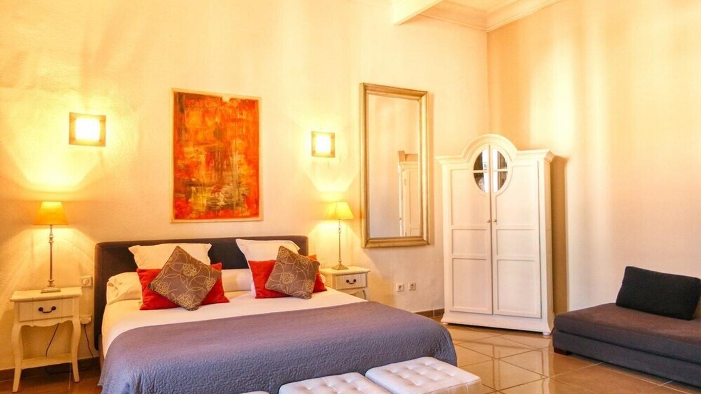 A Propos- Suites et chambres
